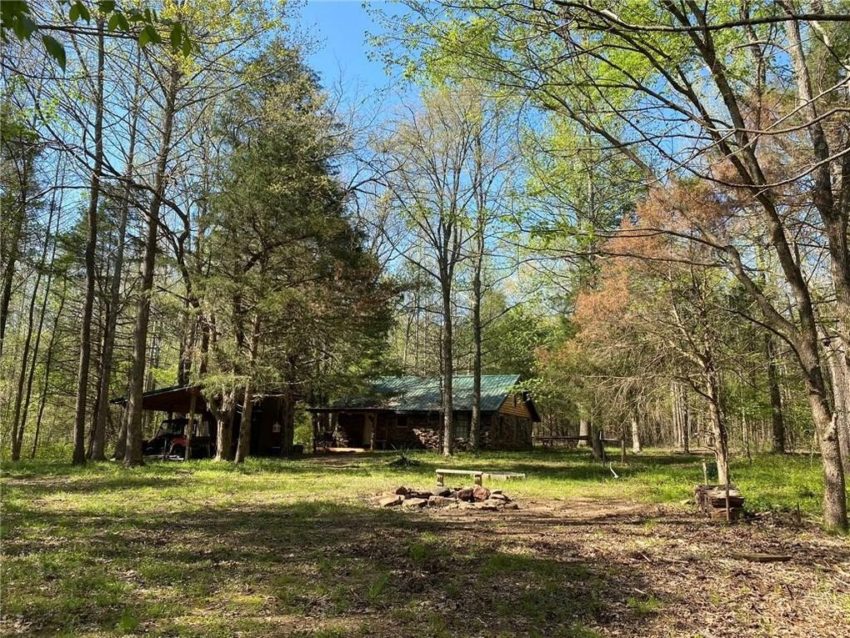 c.1985 Stone Cabin on 48.19 Private Acres w/ 300ft of Riverfront on