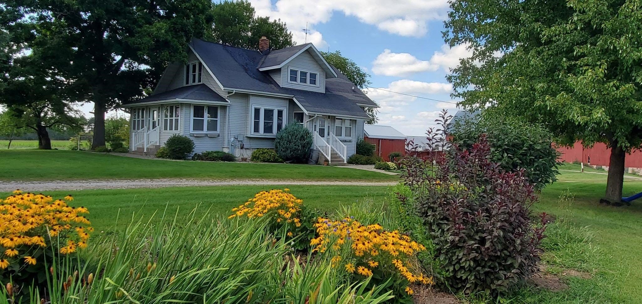 Circa 1937 Wisconsin Farmhouse For Sale W/Barns And Outbuildings on 3.2