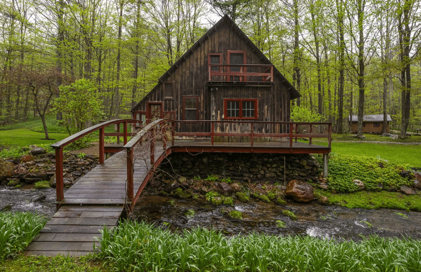 Rustic brook-side cabin